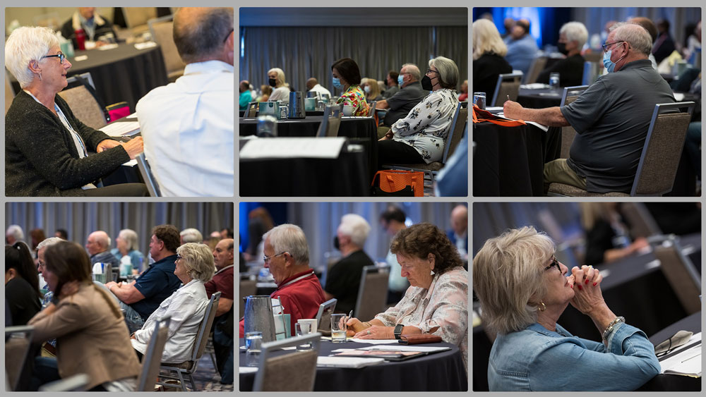 Attendees at conference listening to speakers.